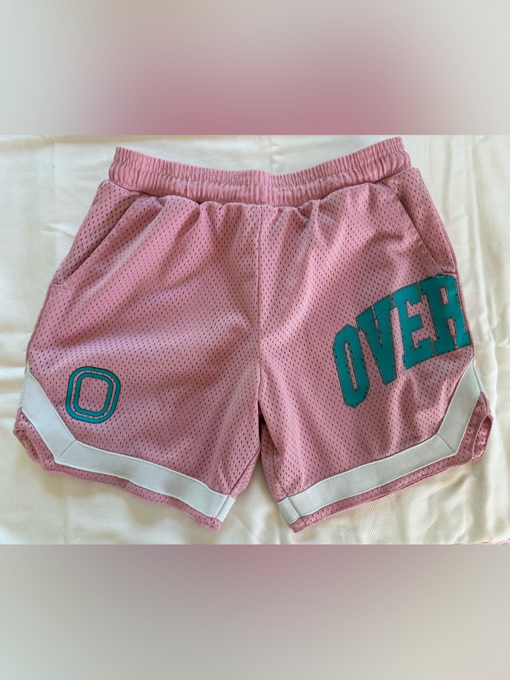 OVERTIME Pink Mesh Athletic Shorts with Teal Lettering